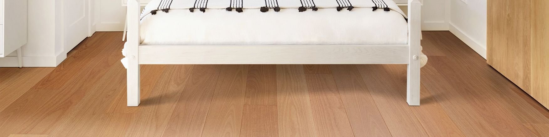 white bed on wood floor - Rickway Carpet in MN